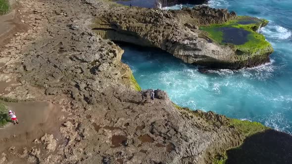 Gorgeous aerial view flight Overfly drone shotBig ocean waves crashing on the rocks of Devil's Tear
