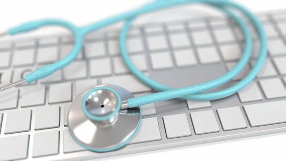 Stethoscope on Keyboard with CLINIC Text alt