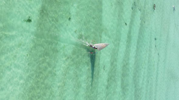 Vertical Video Boats in the Ocean Near the Coast of Zanzibar Tanzania Aerial View