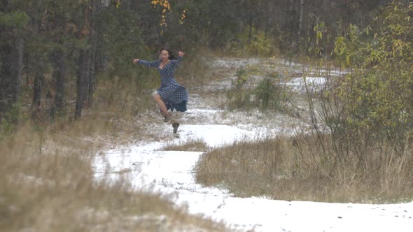 Girl in Forest and First Snow