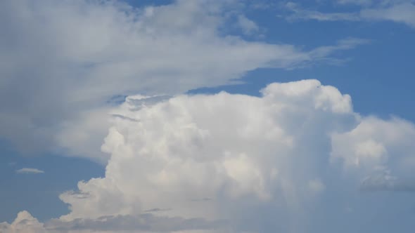 Time lapse of clouds formations. Spring clouds timelapse. Blue skies alt