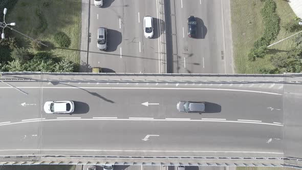 Cars Ride on the Road. Slow Motion. Kyiv. Ukraine. Aerial, Gray, Flat