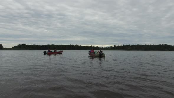 Boats floating on a lake