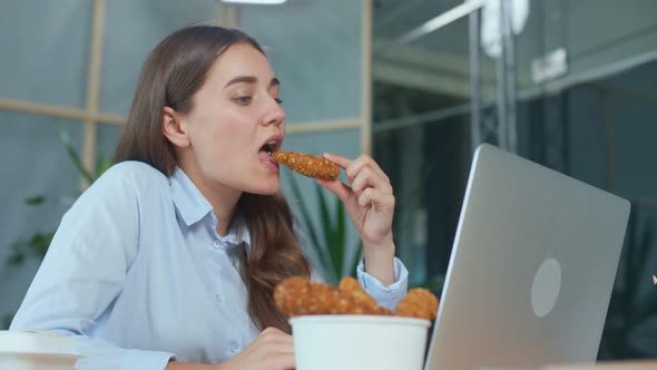 Young Woman Dines at The Workplace Eat Instant Snacks Fatty Foods Diabetes