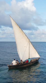 Boat Boats in the Ocean Near the Coast of Zanzibar Tanzania Slow Motion Vertical Video