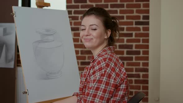 Portrait of Young Student Learning to Draw Vase Masterpiece