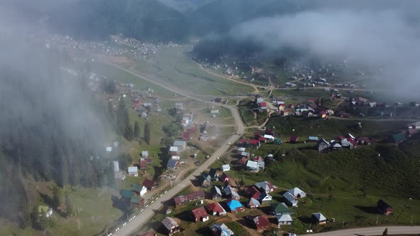 Misty Aerial View Of High Mountain Village