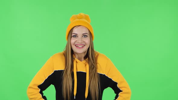 Portrait of Modern Girl in Yellow Hat in Anticipation of Worries, Then Disappointed and Upset