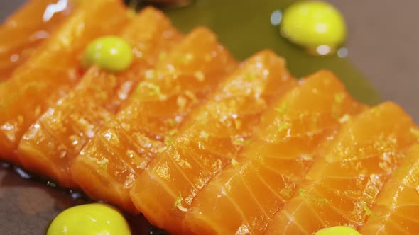 Salmon Raw Sashimi Japanese Traditional Dish on Table