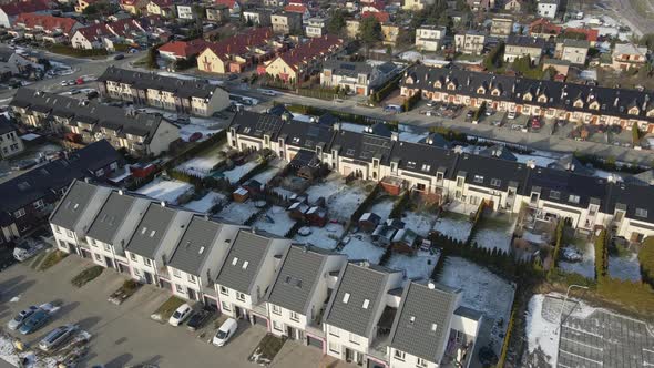 Aerial View of Small European City with Modern Residential Suburb Neighborhood