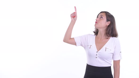 Happy Beautiful Businesswoman Talking While Pointing Up