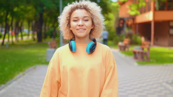 Portrait Friendly Mixed Race Woman on the Street