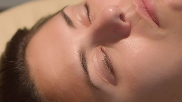 Beautician Hands Distributing Eye Lashes of the Client on the Silicone Pad for Lamination Procedure