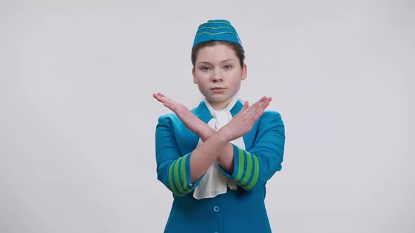Caucasian Girl in Air Hostess Uniform Crossing Hands No Gesture Shaking Head Looking at Camera with