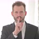 Middle Aged Businessman Putting Fingers on Lips Quiet Sign - VideoHive Item for Sale
