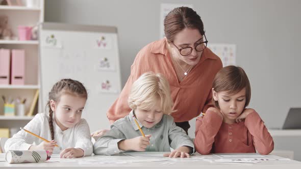 Kids Doing Exercises on Speech Therapy