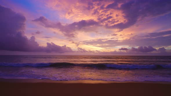 Beautiful sunset over the sea at tranquil tropical beach in summer