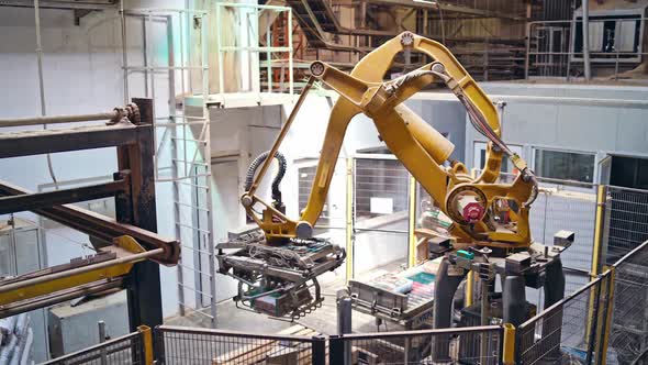 Industrial robot arm at a modern factory. Manufacturing production.