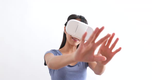 Woman looking though VR device 