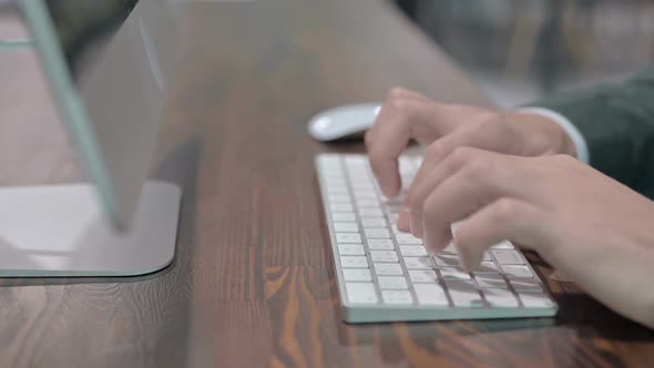 Close Up Shoot of Young Man Hand Typing on Keyboard