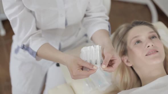 Cropped Top Image of Face of Pretty Smiling Blond Caucasian Woman Ready to Get Beauty Injections