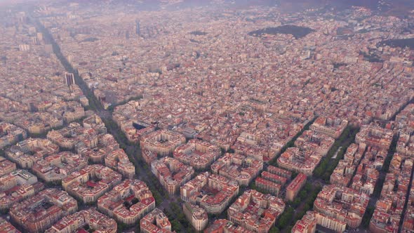 Aerial view of square blocks in new quarter of Barcelona at sunrise, Diagonal Avenue, Spain