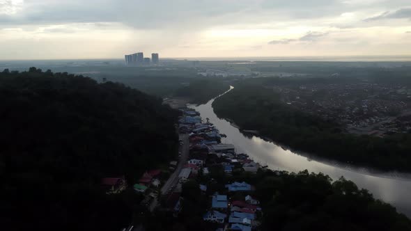 Fly over small fishing village 