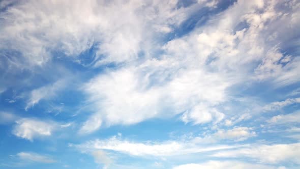 Beautiful clear blue sky with soft cloud timelapse