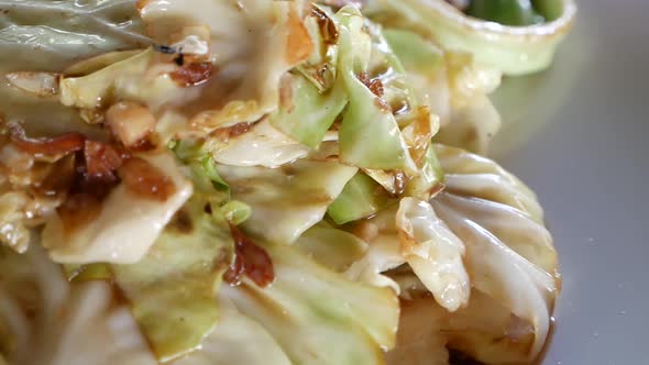 Close Up Footage of Stir Fried Cabbage and Fish Sauce, One of Thailand Famous Dish