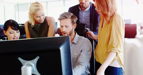 Executives working together at the desk