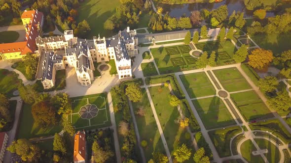 Aerial view of town Lednice and castle yard with green gardens in Moravia, Czech Republic.