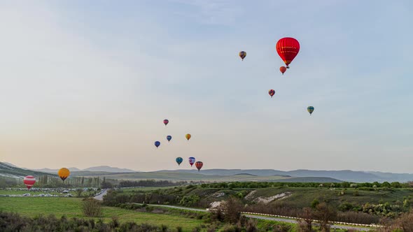 Beautiful Rocky Landscape of Crimea with Colorful Hotair Balloons Balloons Flying on Sunset HDR Time