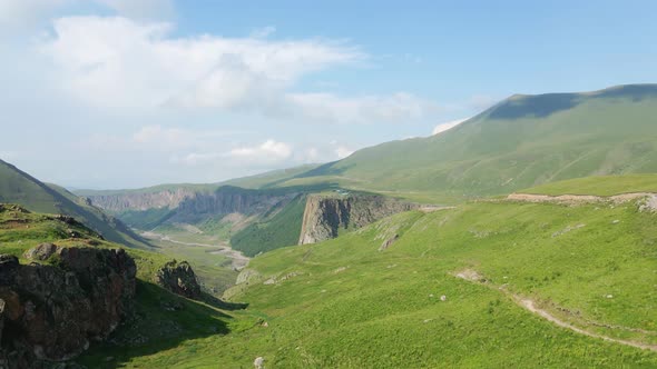 View of the Green Caucasus Mountains in Summer From the Sky