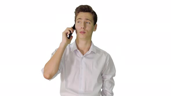 Handsome Man Having Phone Talk While Walking on White Background