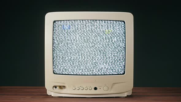 Old Television with Grey Interference Screen on Black Background