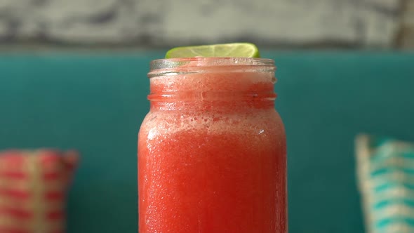 Fresh Tropical Organic Watermelon Smoothie Rotate on Table.