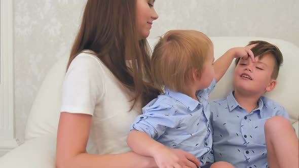 Two Little Boy Kids Having Fun with Their Mom