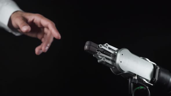 Futuristic Robot Arm Touches Human Hand, Process of Communication and Interaction