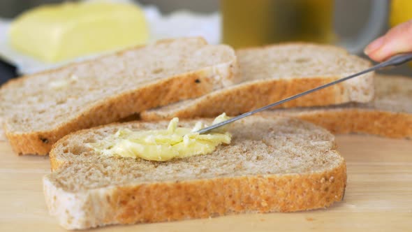 Spreading Vegan Butter On Rye Bread Without Dairy And Eggs