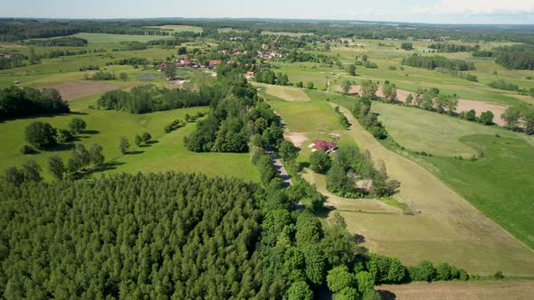 Verdant And Rich Scenery In The Province Of Warmian-Masurian, Poland. Wide Drone Shot