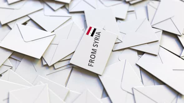 Envelope with From Syria Stamp Among Other Envelopes alt