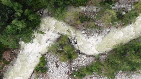 Rough River Runs Winding Between Rocky Steep Banks Aerial