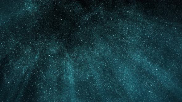 Super Slow Motion Shot of Blue Glittering Atmospheric Particle Background on Black at 1000 Fps