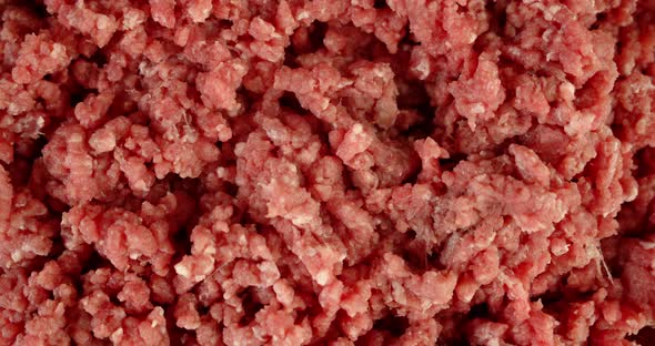 Raw Minced Meat Rotates Slowly. 