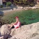 Woman Resting in Borka Beach of Croatia - VideoHive Item for Sale