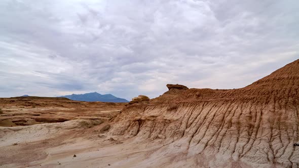 Timelapse of clouds moving over the red desert landscape in Mars Utah