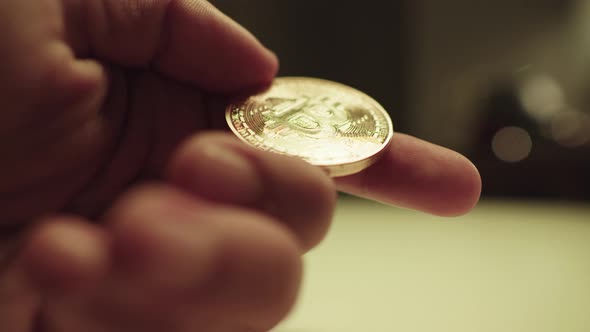 Showing golden bitcoin.