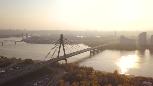 Aerial: The Pivnichniy bridge in Kiyv in autumn, sunset