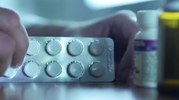 Doctor Offering Pills to a Patient