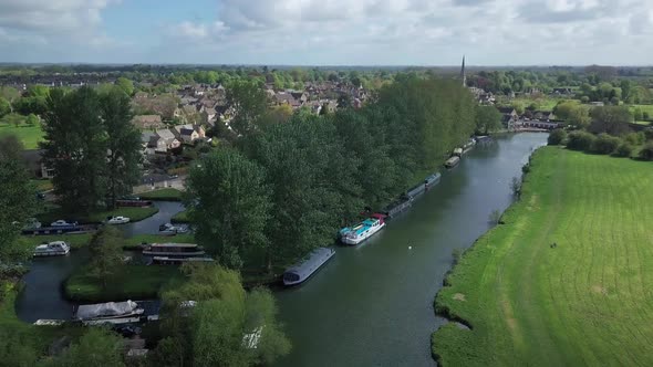 River Thames In Abingdon Town Near Oxford City, UK With A Beautiful Green Landscape During Summer. -
